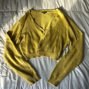 Yellow cardigan. The brand is Wild Fable from Target.